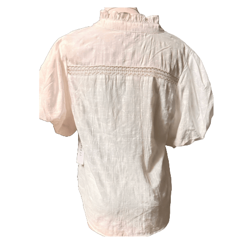 Back view of a petite size white blouse with flowy puffy sleeves and ruffled collar, perfect for stylish layering.