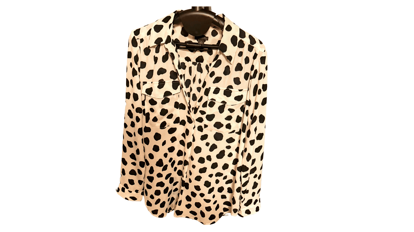 Leopard print blouse on a white background