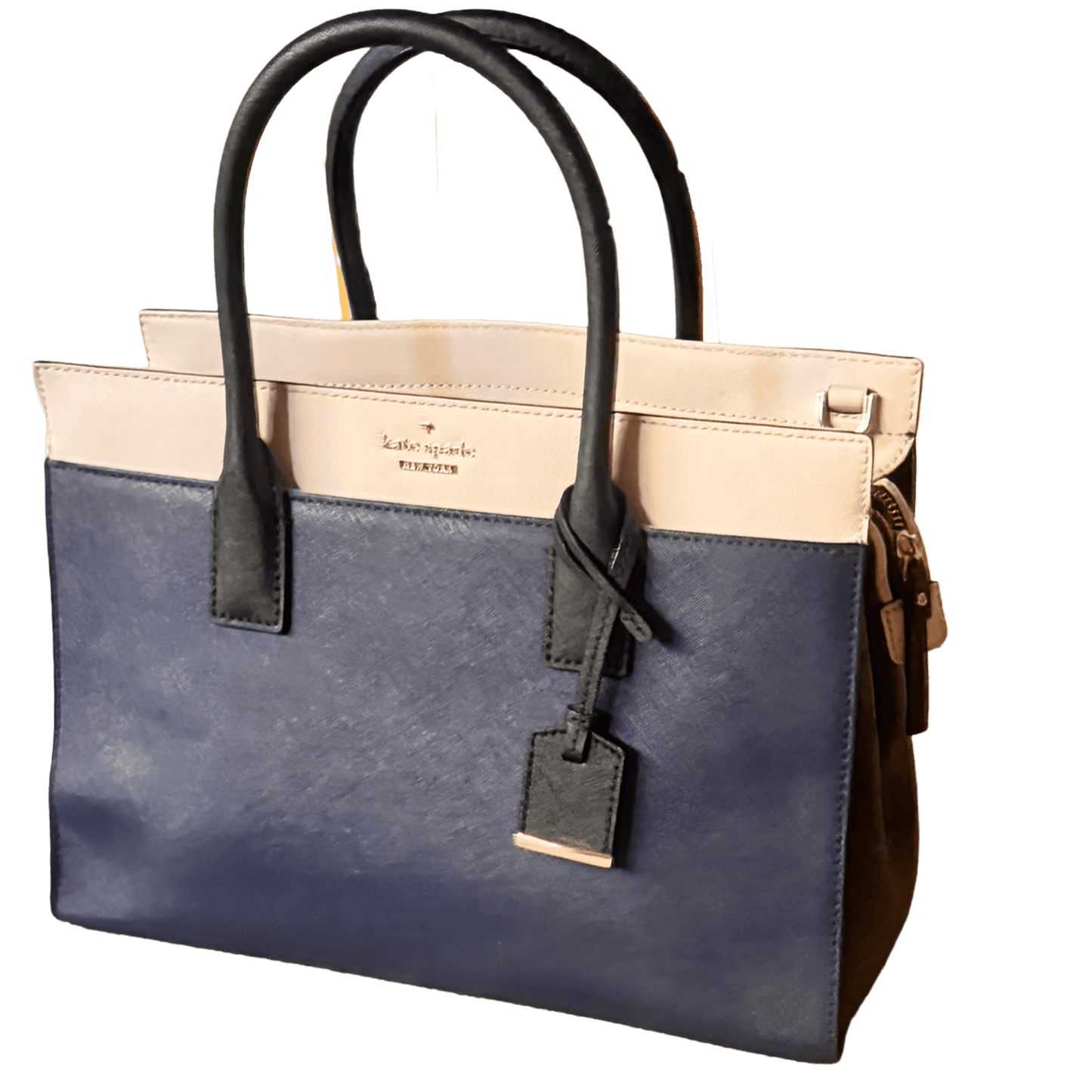 Blue and beige handbag with black handles on a white background