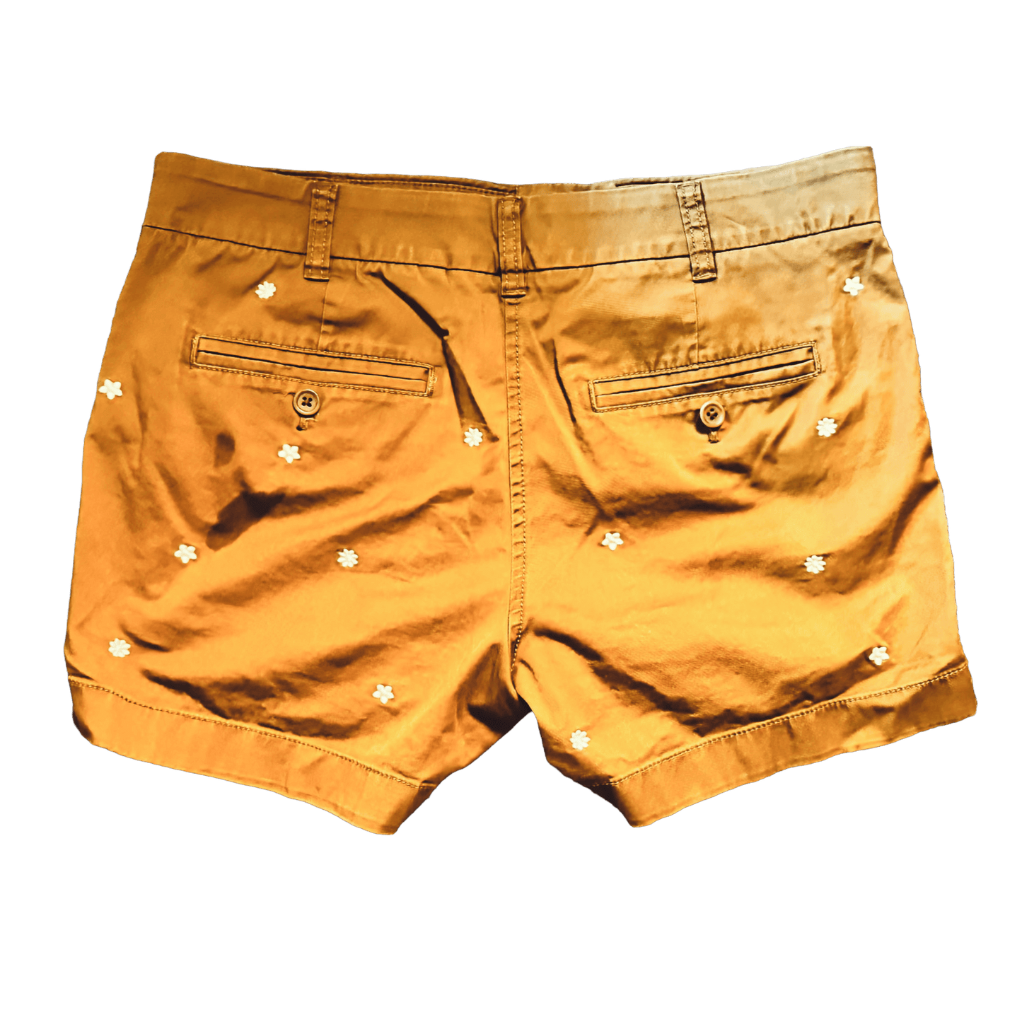brown shorts with white embellishments on a white background