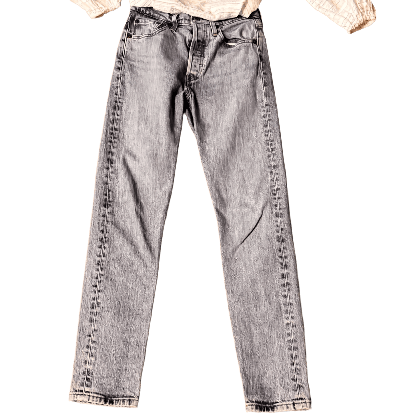 Pair of light blue jeans on a white background