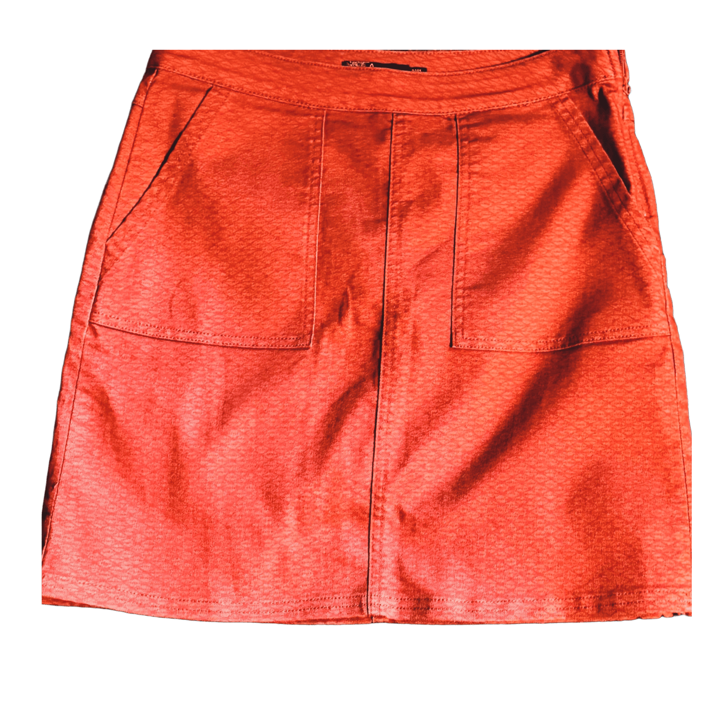 Red skirt with two front pockets on a white background