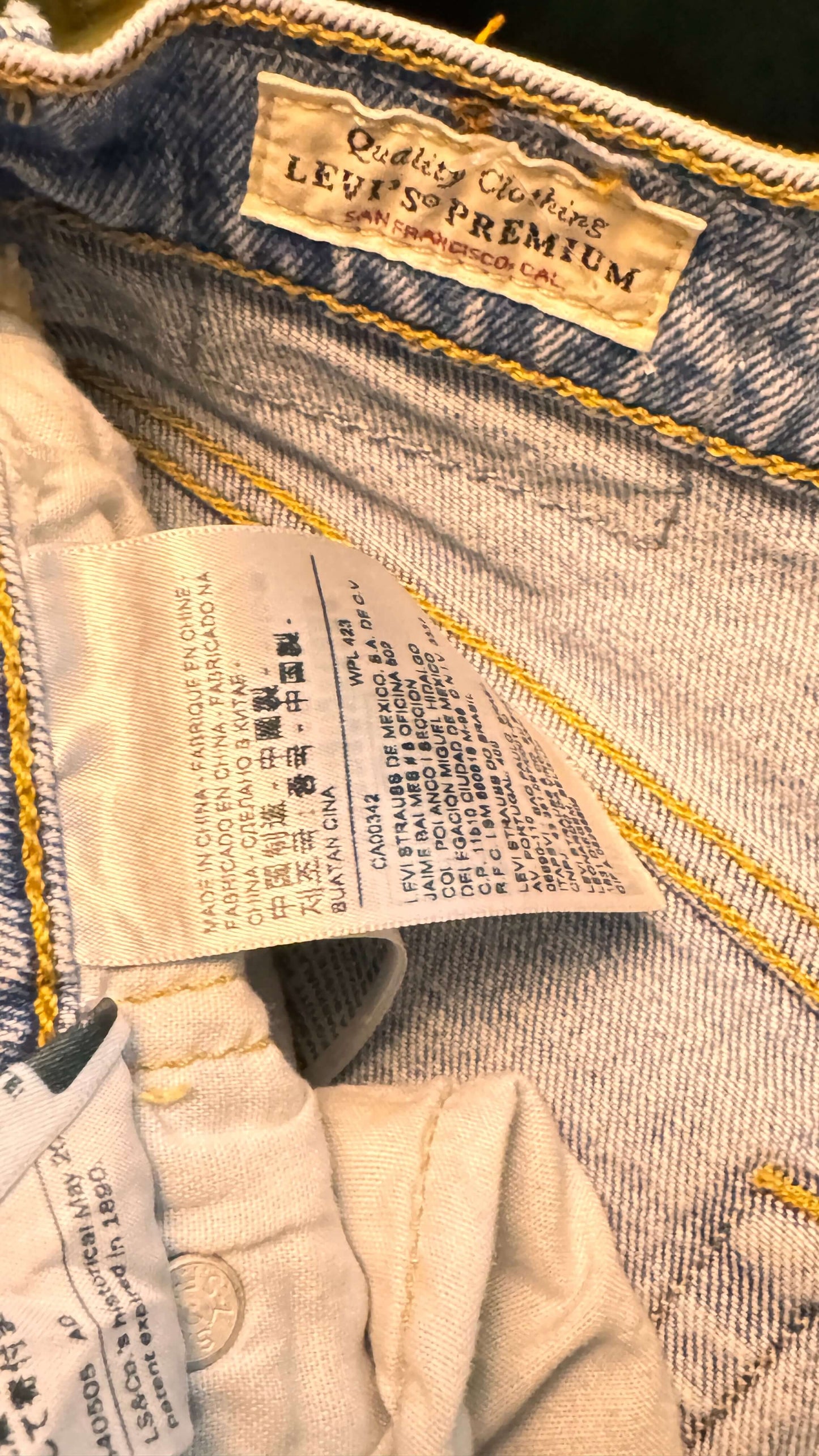 Close-up of Levi's clothing label on a denim fabric.