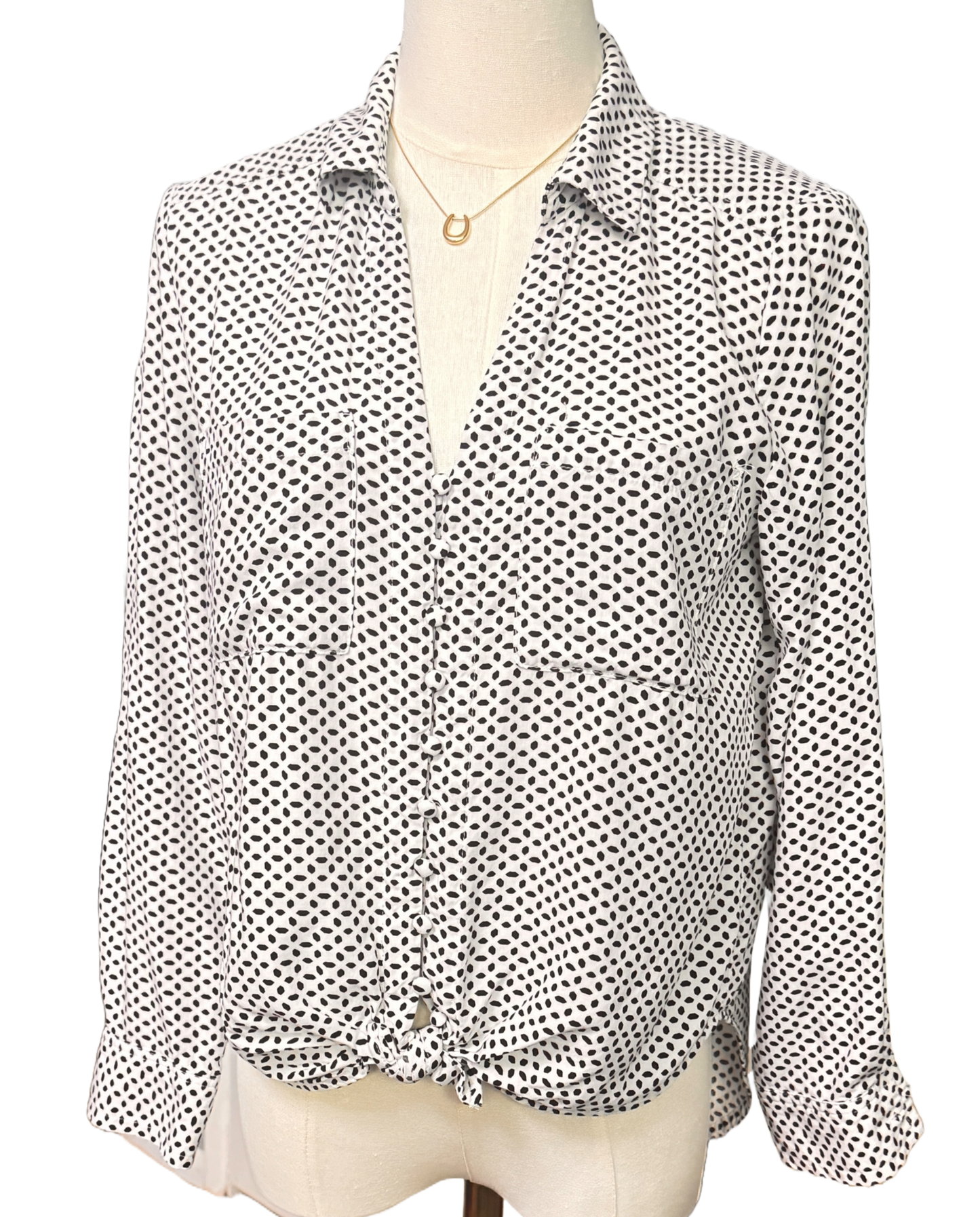 Stylish white Velvet Heart blouse with black geometric shapes, long sleeves, and waist tie for a flattering fit. Size small petite.