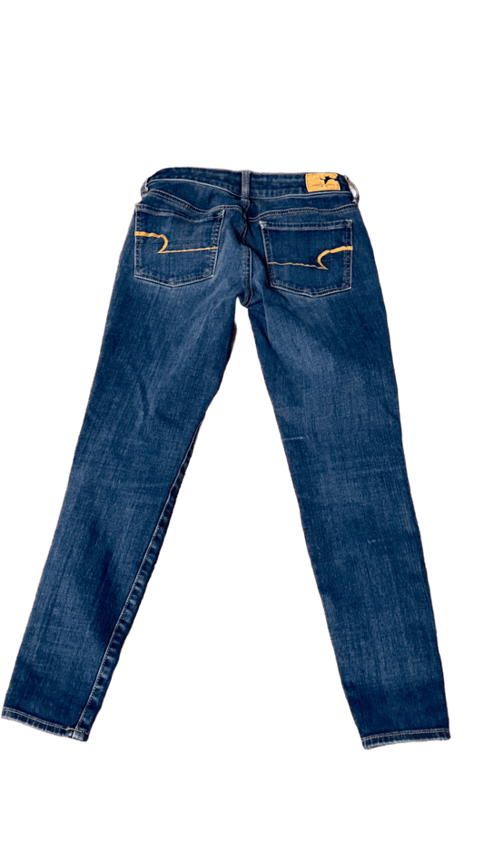 Back view of secondhand American Eagle denim bottoms, size 4 petite, featuring a stylish and durable design.