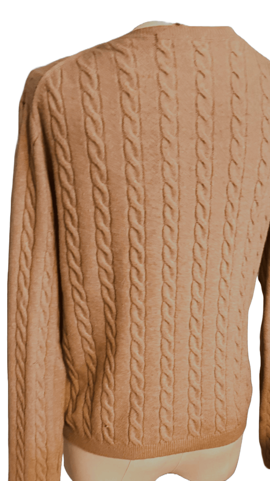 Brown cable knit sweater on a mannequin with a white background