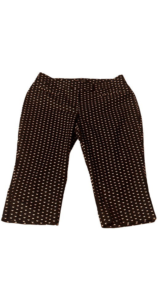 Stylish Apartment 9 chino pants size 14 Petite with white hearts on black, perfect for work or casual outings.