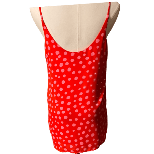 Back view of LOFT sleeveless blouse in red with pink polka dots, size small, lightweight and stylish.