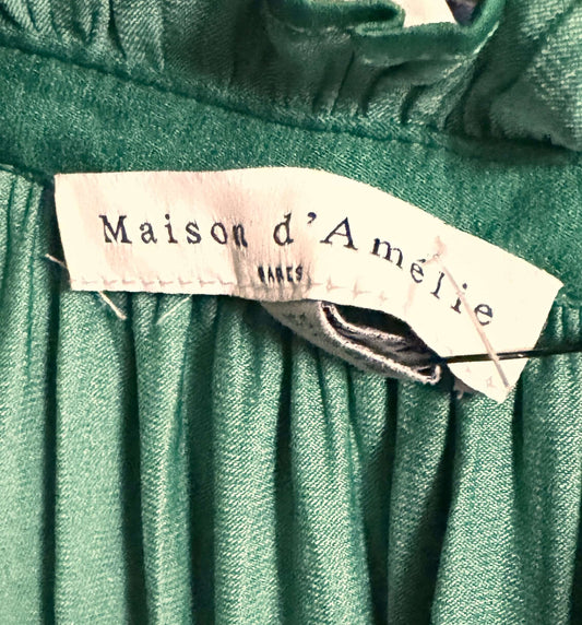 Maison D'Amelie green blouse tag, showcasing brand name and fabric texture, perfect for small petite size.