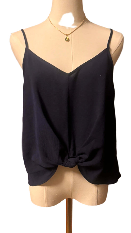 Lush sleeveless navy halter top on a dress form, featuring a knotted front and adjustable straps, perfect for petites.