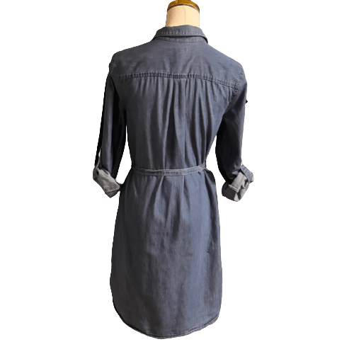 Denim dress on a mannequin with a white background