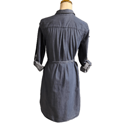 Denim dress on a mannequin with a white background