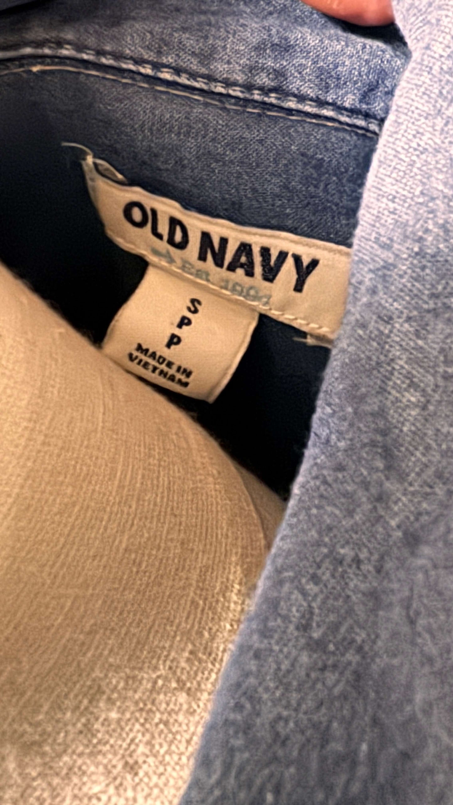 Close-up of an Old Navy label on a denim garment.