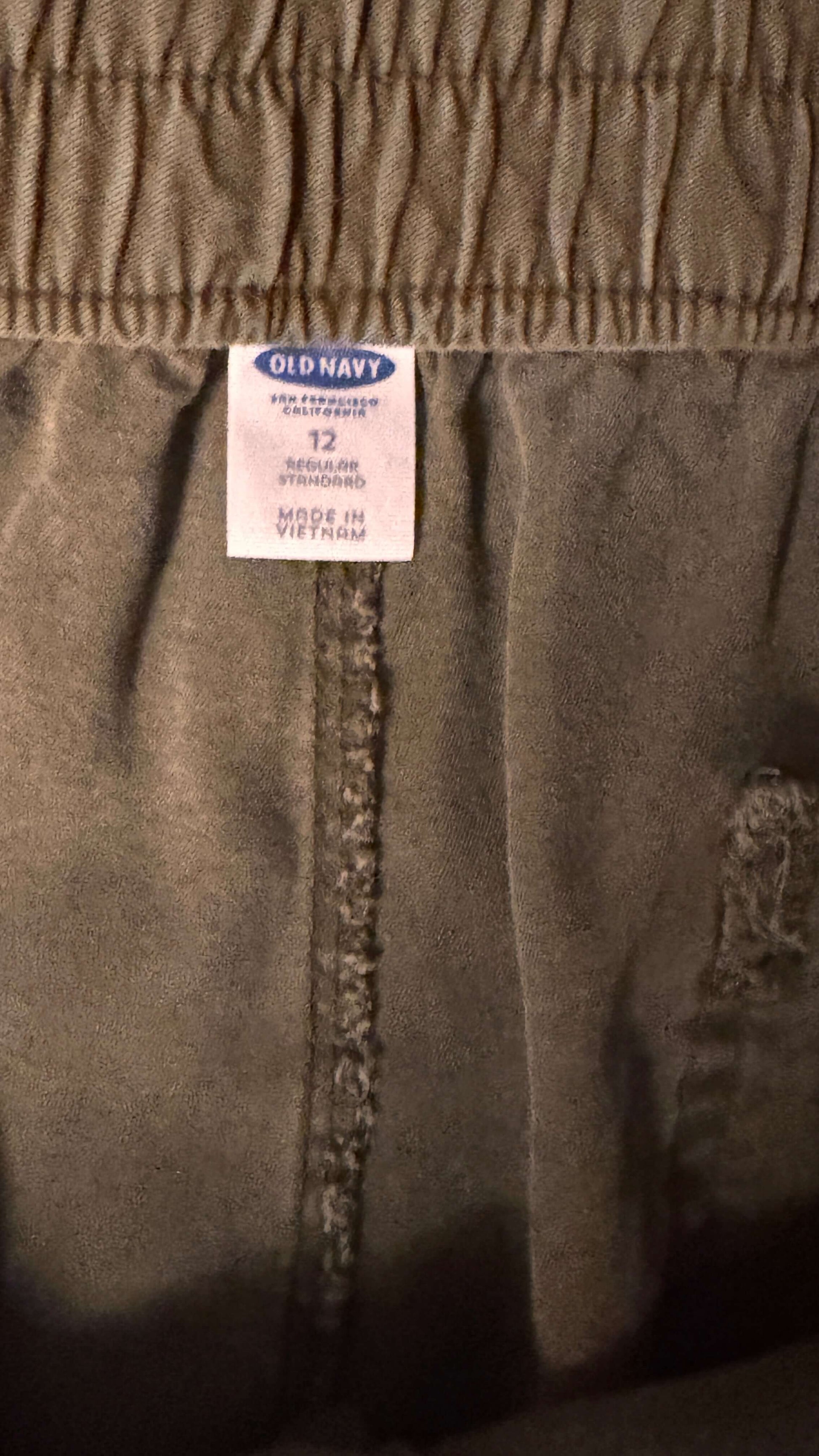 Old Navy size 12 petite soft pants label showing 4 pockets in a relaxed fit design.