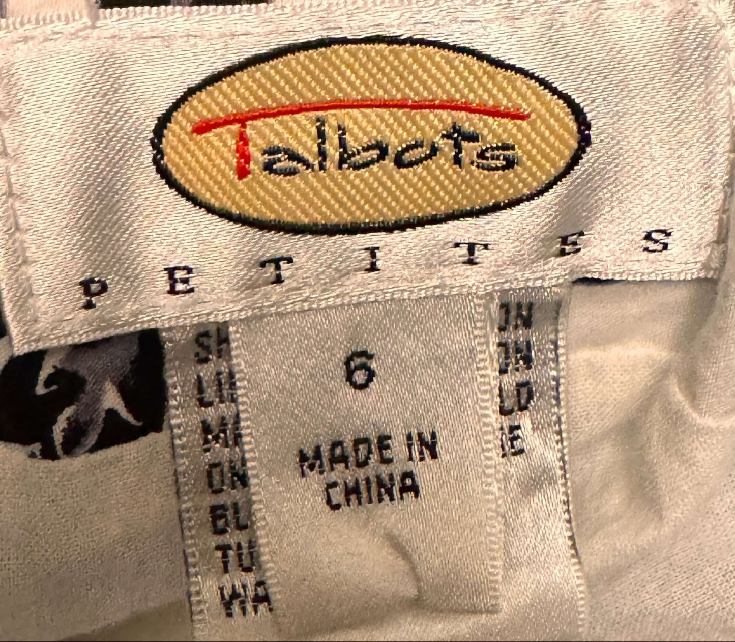 talbots black and white skirt tag showing size 6