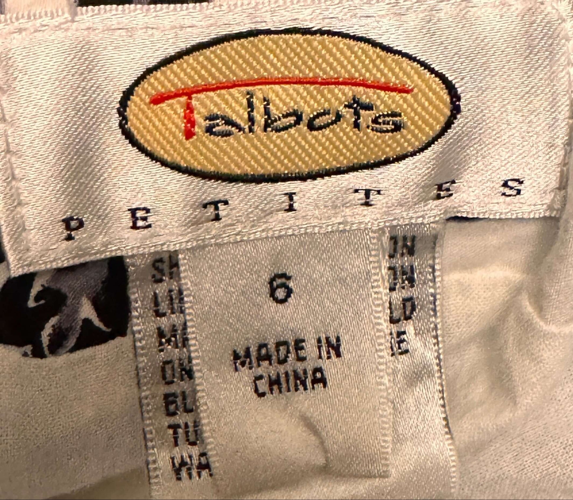 talbots black and white skirt tag showing size 6