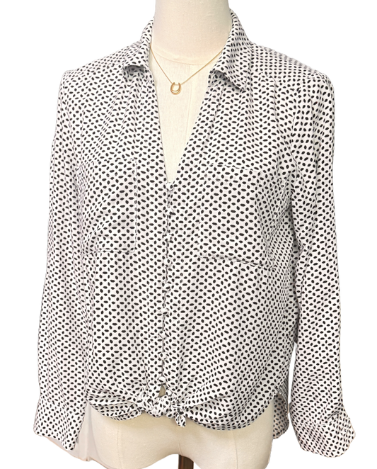 Stylish white Velvet Heart blouse with black geometric shapes, long sleeves, and waist tie for a flattering fit. Size small petite.