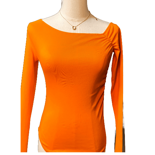 Zara orange one-piece romper for petites, featuring long sleeves and modern design, perfect for casual or dressed-up occasions.